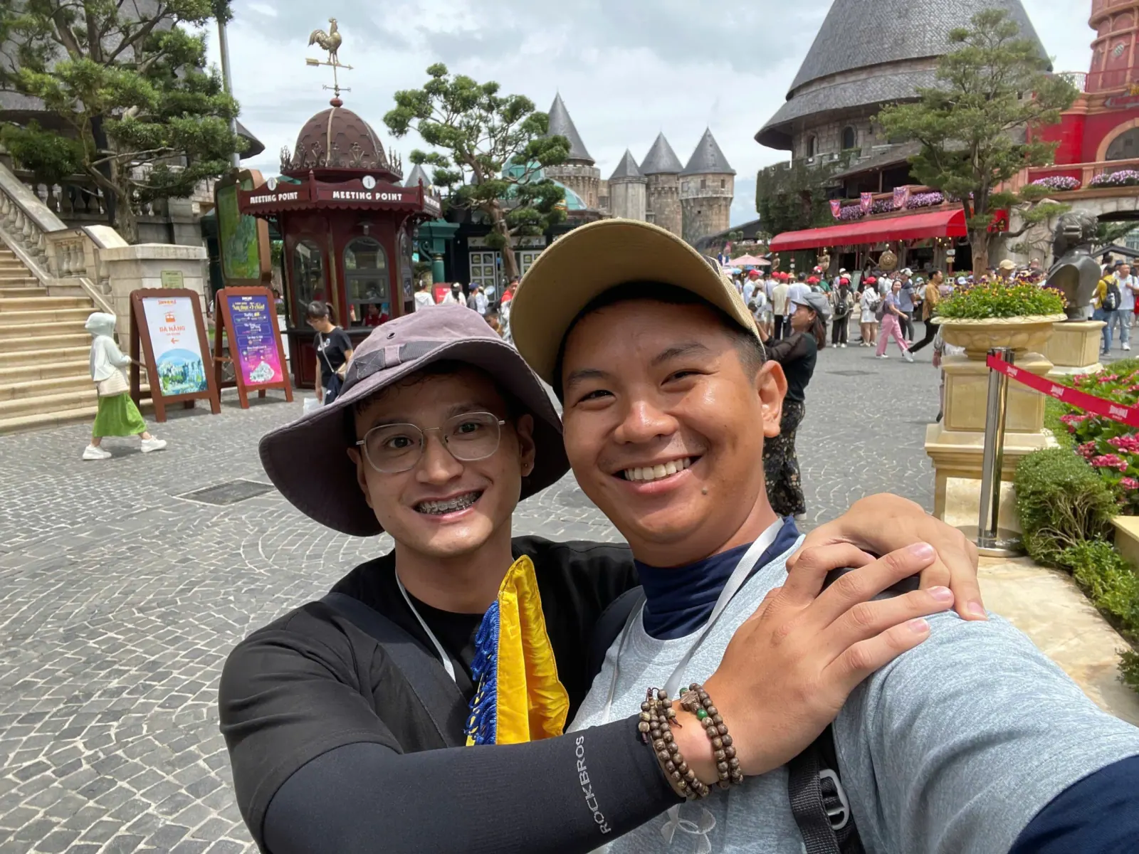 Tom with a guest in front of the French village towers at Ba Na Hills